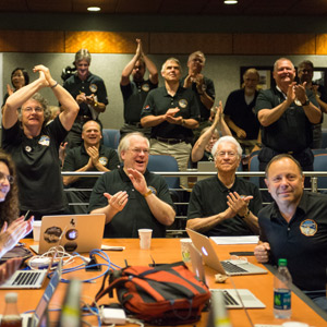 Part of the New Horizons team celebrating the spacecraft's flyby of Pluto.
